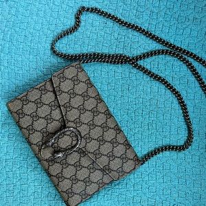 Gucci clutch crossbody bag in a perfect condition